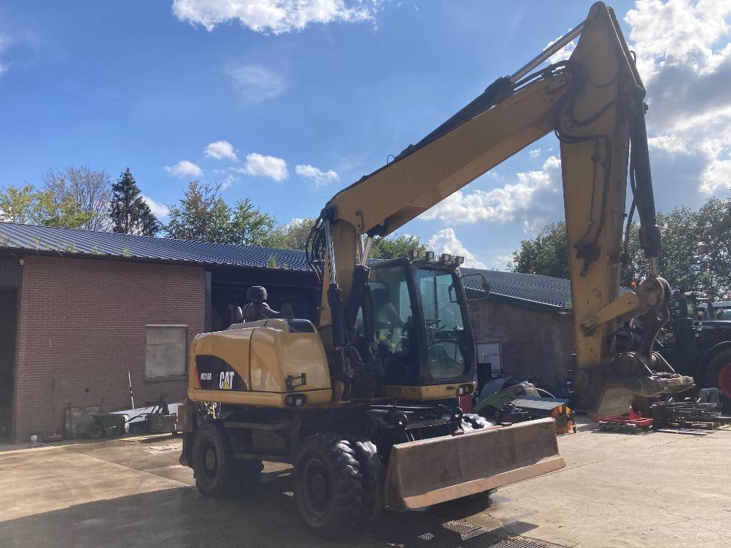 Wheel excavator CAT M 316 D: picture 6