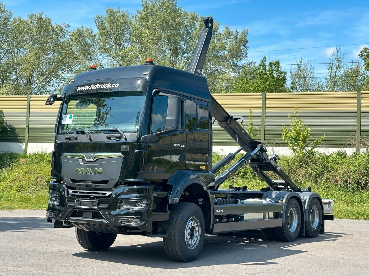 MAN TGS 33.520 6X4 Euro6e Abrollkipper MULTILIFT - Hook lift truck, Crane truck: picture 1 MAN TGS 33.520 6X4 Euro6e Abrollkipper MULTILIFT - Hook lift truck, Crane truck: picture 1
