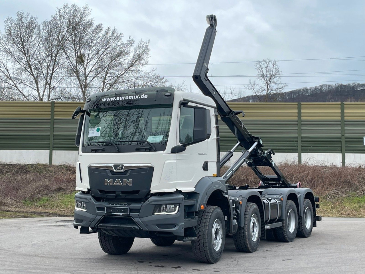 MAN TGS 35.470 8x4 Euro6e Hiab MultLift Abrollkipper - Hook lift truck, Crane truck: picture 1 MAN TGS 35.470 8x4 Euro6e Hiab MultLift Abrollkipper - Hook lift truck, Crane truck: picture 1