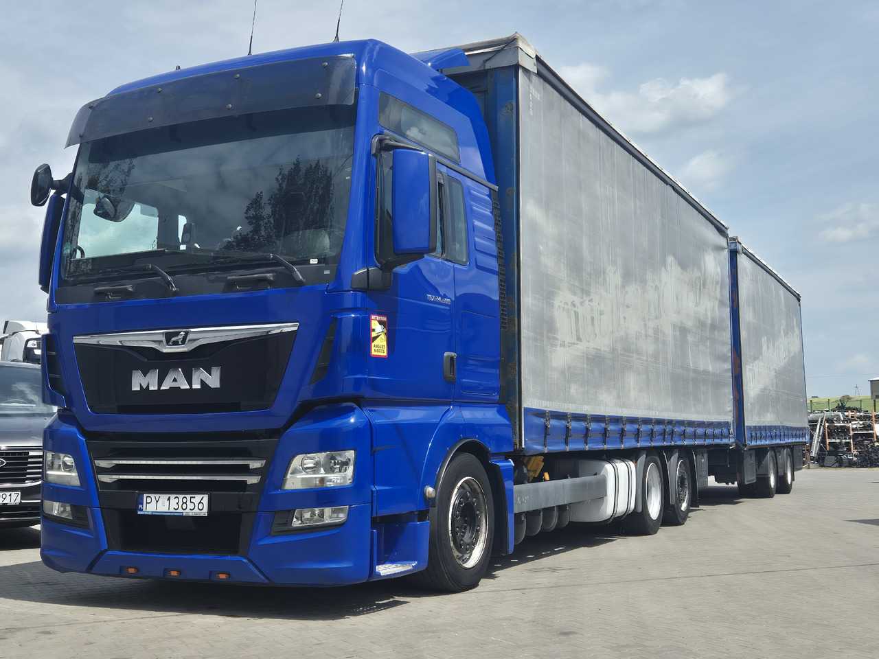 MAN tgx 24,500 - Curtain side truck: picture 1 MAN tgx 24,500 - Curtain side truck: picture 1