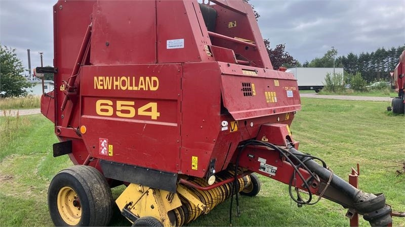 New Holland 654 RUNDBALLEPRESSER Cropcutter - Round baler: picture 1 New Holland 654 RUNDBALLEPRESSER Cropcutter - Round baler: picture 1