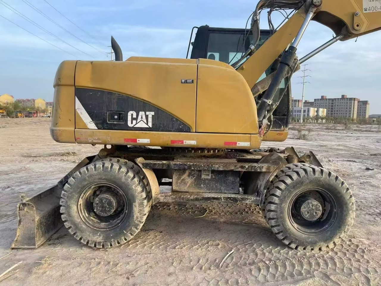 CATERPILLAR M315 - Wheel excavator: picture 1 CATERPILLAR M315 - Wheel excavator: picture 1