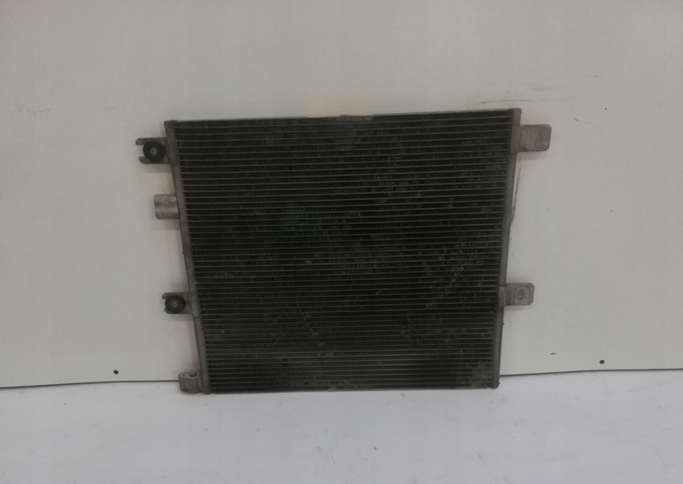 CHŁODNICA KLIMY VOLVO FL ORGINAŁ 21675287 18R. - Condenser for Truck: picture 1 CHŁODNICA KLIMY VOLVO FL ORGINAŁ 21675287 18R. - Condenser for Truck: picture 1