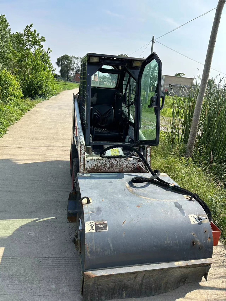 BOBCAT S70 Sliding Sweeper Click for Discount - Skid steer loader: picture 1 BOBCAT S70 Sliding Sweeper Click for Discount - Skid steer loader: picture 1