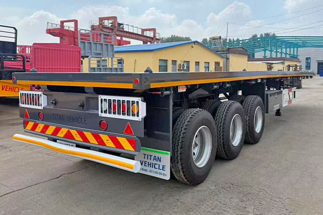 TITAN 3 Axle Flatbed Semi Trailer for Sale in Ghana - Dropside/ Flatbed semi-trailer: picture 2 TITAN 3 Axle Flatbed Semi Trailer for Sale in Ghana - Dropside/ Flatbed semi-trailer: picture 2