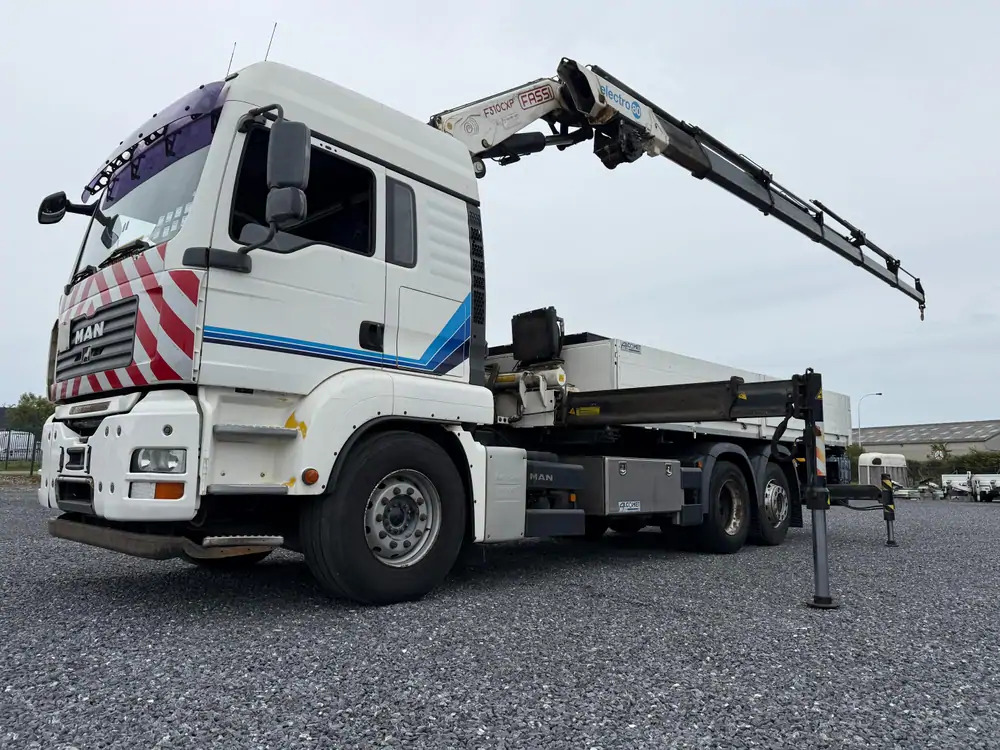 MAN TGA 26.400 *FASSI 31 TM*6EXTENSIONS*WINCH*REMOTE*BDF BOX - Dropside/ Flatbed truck, Crane truck: picture 1 MAN TGA 26.400 *FASSI 31 TM*6EXTENSIONS*WINCH*REMOTE*BDF BOX - Dropside/ Flatbed truck, Crane truck: picture 1