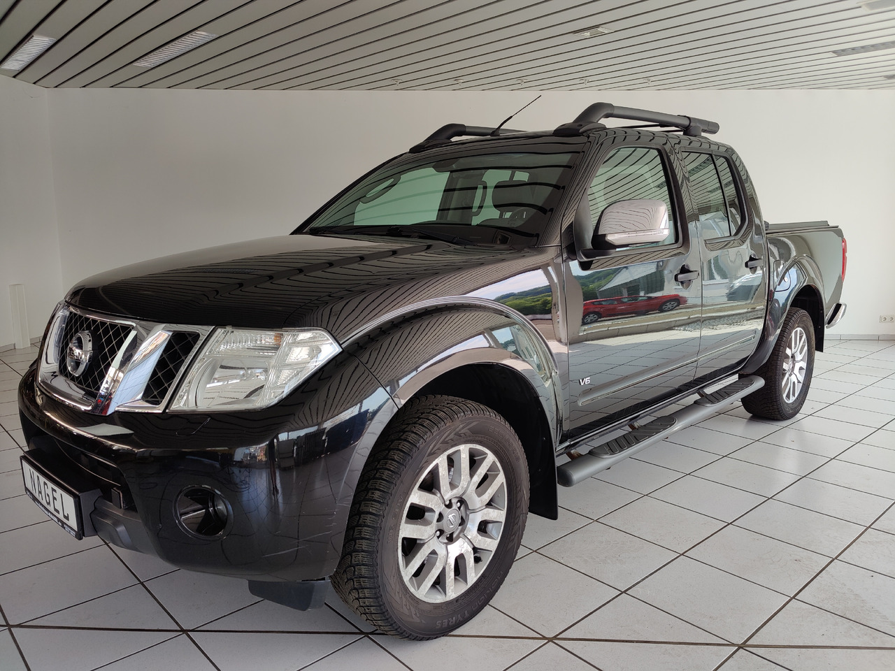 Nissan Navara Pickup (D40M)(05.2005->) Double Cab LE V6 4X4 Navi Kam Leder SHZ AHK - Pickup truck: picture 1 Nissan Navara Pickup (D40M)(05.2005->) Double Cab LE V6 4X4 Navi Kam Leder SHZ AHK - Pickup truck: picture 1