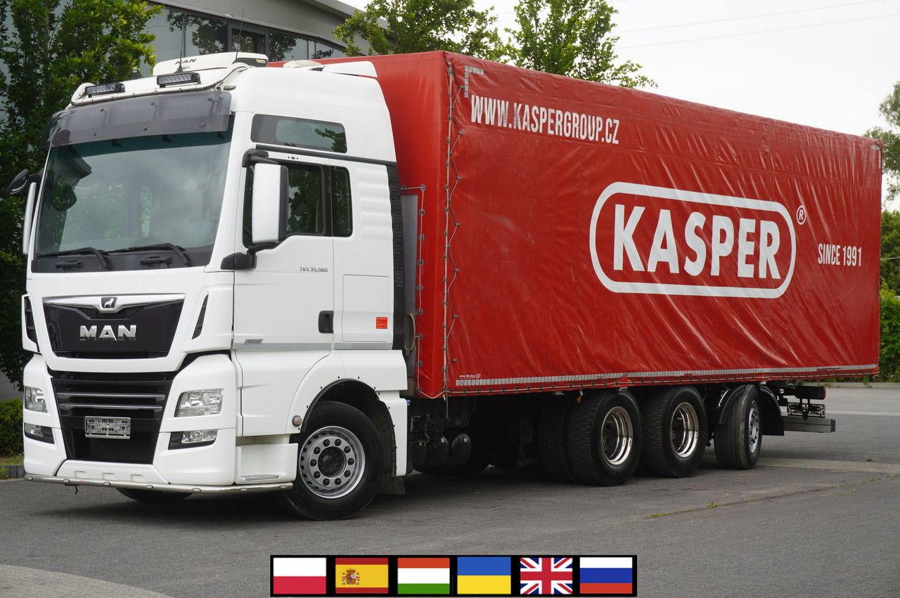 MAN MAN TGX 35.580 E6 8x4 /4 / 23 EPAL tarp superstructure / 4th axle steered - Curtain side truck: picture 1 MAN MAN TGX 35.580 E6 8x4 /4 / 23 EPAL tarp superstructure / 4th axle steered - Curtain side truck: picture 1