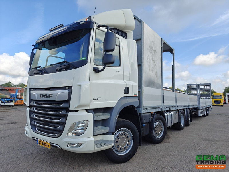 DAF CF 430 FAX 8x2/6 Dagcabine Euro6D - Machine Transporter + 2assige Aanhanger - Hydraulische Rampen - Afneembare 10.000L WaterTank - 20.000km! Origineel - Car transporter truck: picture 1 DAF CF 430 FAX 8x2/6 Dagcabine Euro6D - Machine Transporter + 2assige Aanhanger - Hydraulische Rampen - Afneembare 10.000L WaterTank - 20.000km! Origineel - Car transporter truck: picture 1