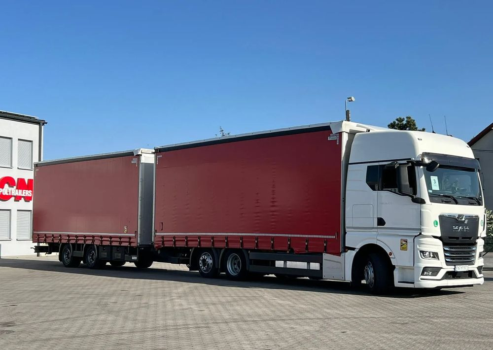 MAN TGX 26.470 z przyczepą Redos - Curtain side truck: picture 2 MAN TGX 26.470 z przyczepą Redos - Curtain side truck: picture 2