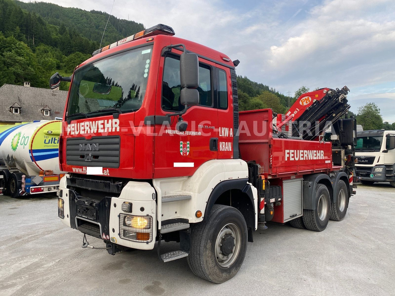 MAN 33.440 6x6 KRAN PM27 und Frontseilwinde 60lm - Dropside/ Flatbed truck, Crane truck: picture 1 MAN 33.440 6x6 KRAN PM27 und Frontseilwinde 60lm - Dropside/ Flatbed truck, Crane truck: picture 1