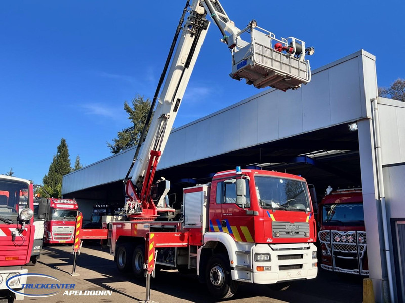 MAN TGA 26.350 Magirus ALP 320L = 32 meter, Waterpomp, 6x4, Bladgeveerd - Fire engine: picture 2 MAN TGA 26.350 Magirus ALP 320L = 32 meter, Waterpomp, 6x4, Bladgeveerd - Fire engine: picture 2