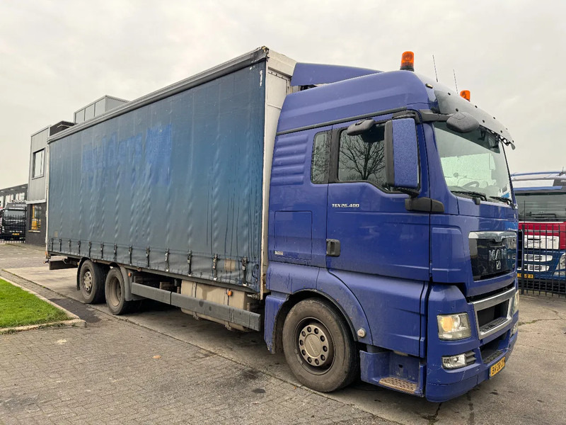 MAN TGX 26.400 6X2 - EURO 4 + LIFT + STEERING AXLE - Curtain side truck: picture 3 MAN TGX 26.400 6X2 - EURO 4 + LIFT + STEERING AXLE - Curtain side truck: picture 3