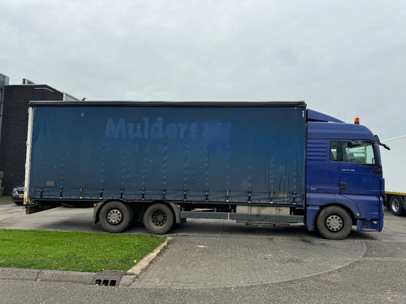 MAN TGX 26.400 6X2 - EURO 4 + LIFT + STEERING AXLE - Curtain side truck: picture 4 MAN TGX 26.400 6X2 - EURO 4 + LIFT + STEERING AXLE - Curtain side truck: picture 4