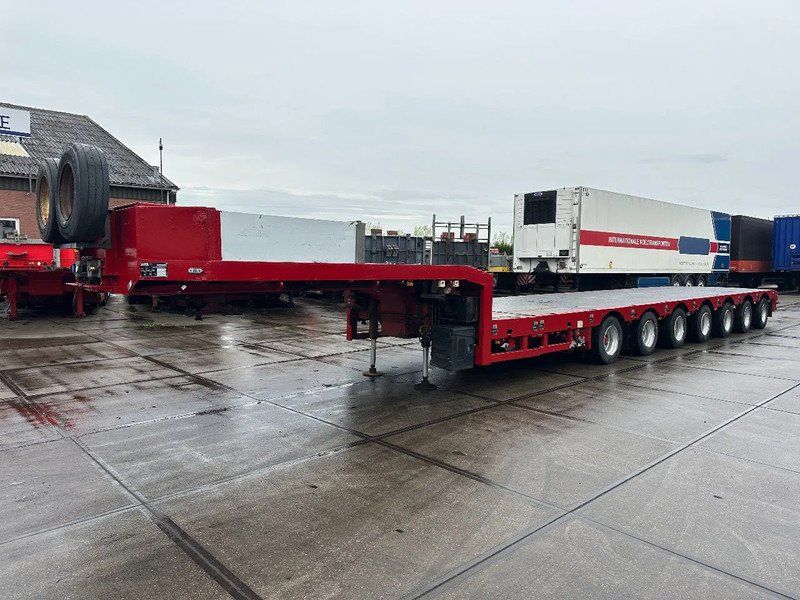 Stokota S7U.H5-01, 7 AXLE, 5 AXLE FORCED STEERING, 8, M EXTENDABLE, 1+2E LIFT AXLE - Low loader semi-trailer: picture 1 Stokota S7U.H5-01, 7 AXLE, 5 AXLE FORCED STEERING, 8, M EXTENDABLE, 1+2E LIFT AXLE - Low loader semi-trailer: picture 1