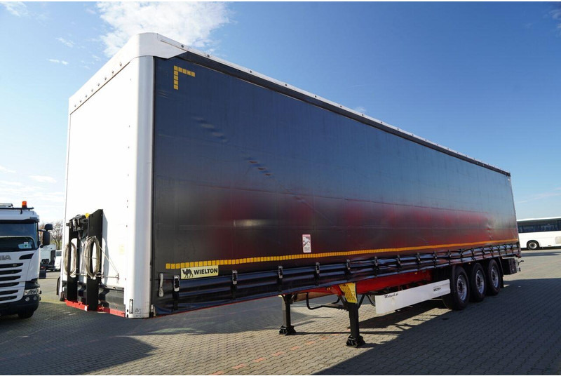 Wielton FIRANKA STANDARD / MULDA DO STALI - 9 M / OŚ PODNOSZONA / SAF / - Curtainsider semi-trailer: picture 4 Wielton FIRANKA STANDARD / MULDA DO STALI - 9 M / OŚ PODNOSZONA / SAF / - Curtainsider semi-trailer: picture 4
