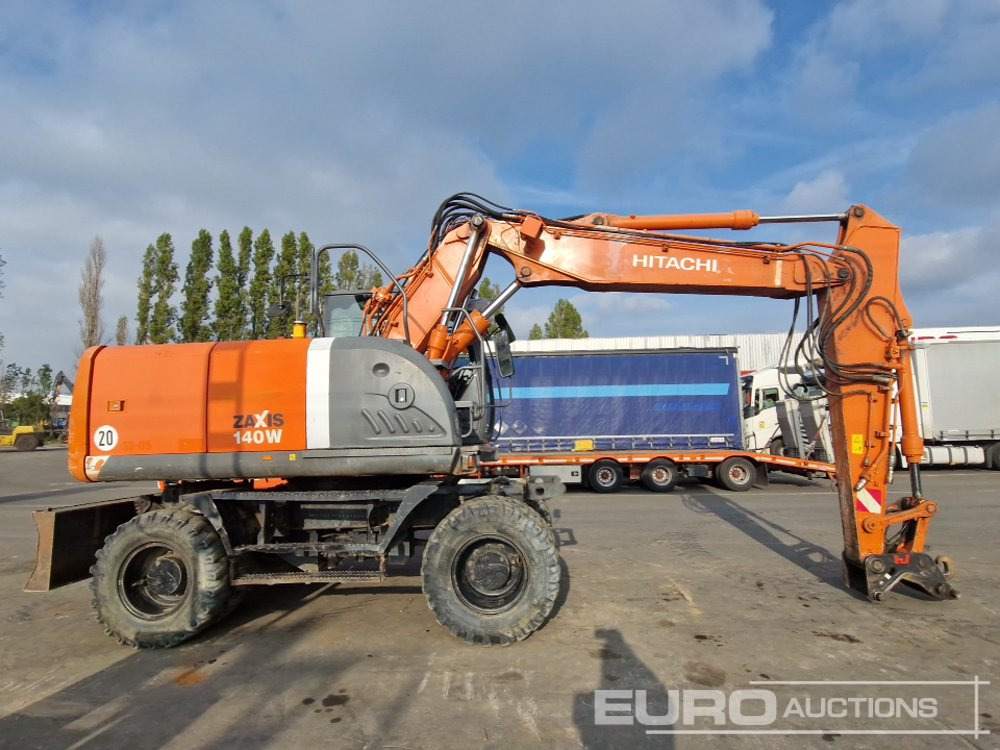 Wheel excavator Hitachi ZX140W-3: picture 6