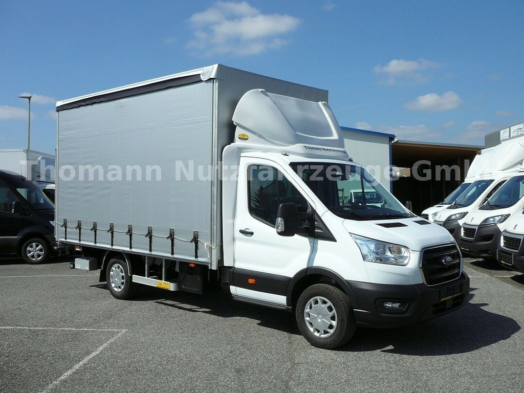 Ford Transit Pritsche Plane Ladebordwand Klima Temp. Ford Transit Pritsche Plane Ladebordwand Klima Temp. - Curtain side van: picture 1 Ford Transit Pritsche Plane Ladebordwand Klima Temp. Ford Transit Pritsche Plane Ladebordwand Klima Temp. - Curtain side van: picture 1