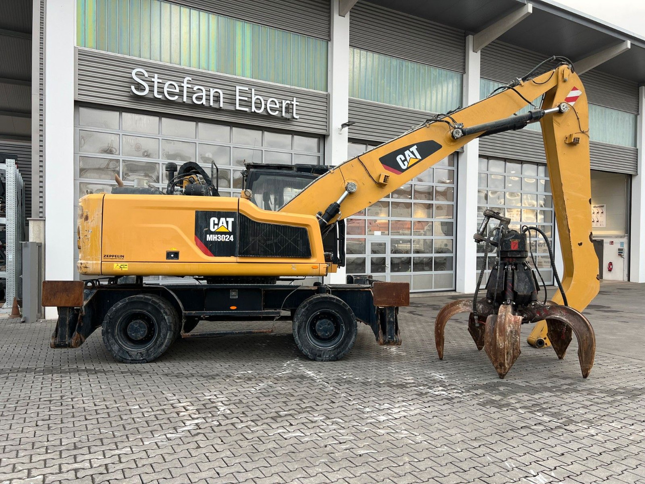 CAT MH3024 / MH 3024 / Greifer / 2018 / 10.735h - Wheel excavator: picture 3 CAT MH3024 / MH 3024 / Greifer / 2018 / 10.735h - Wheel excavator: picture 3