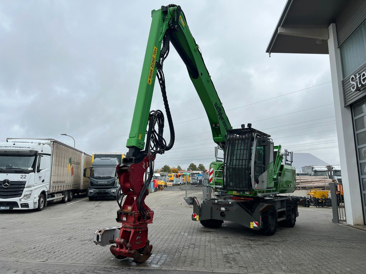 Sennebogen 718 / inkl. Vosch Fällzange / nur 1.965h! - Wheel excavator: picture 5 Sennebogen 718 / inkl. Vosch Fällzange / nur 1.965h! - Wheel excavator: picture 5