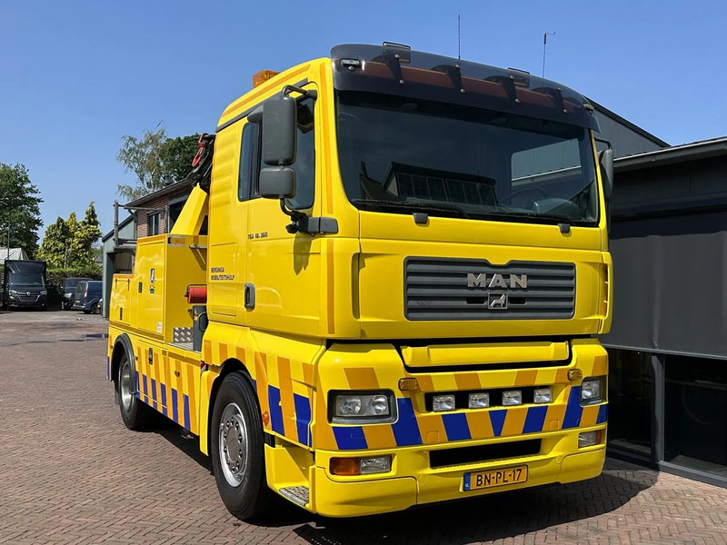 MAN TGA 18.360 Takelwagen Palfinger Kraan Falkom Brill - Tow truck: picture 1 MAN TGA 18.360 Takelwagen Palfinger Kraan Falkom Brill - Tow truck: picture 1