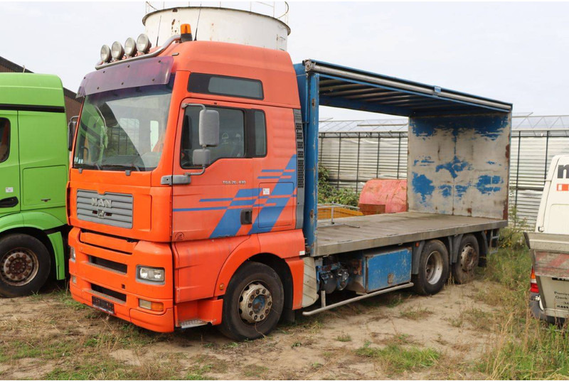 MAN TGA 26.430 - Dropside/ Flatbed truck: picture 1 MAN TGA 26.430 - Dropside/ Flatbed truck: picture 1
